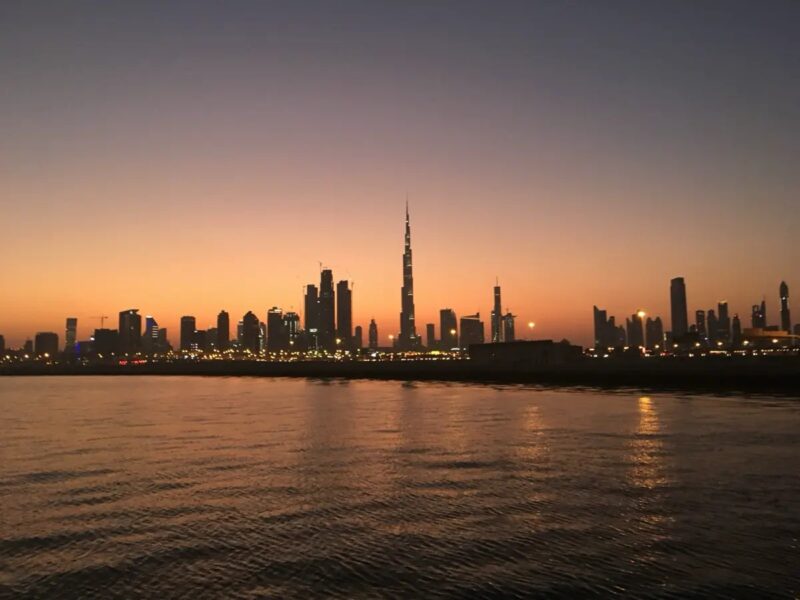 Downtown Dubai skyline with the Burj Khalifa at dusk across the water