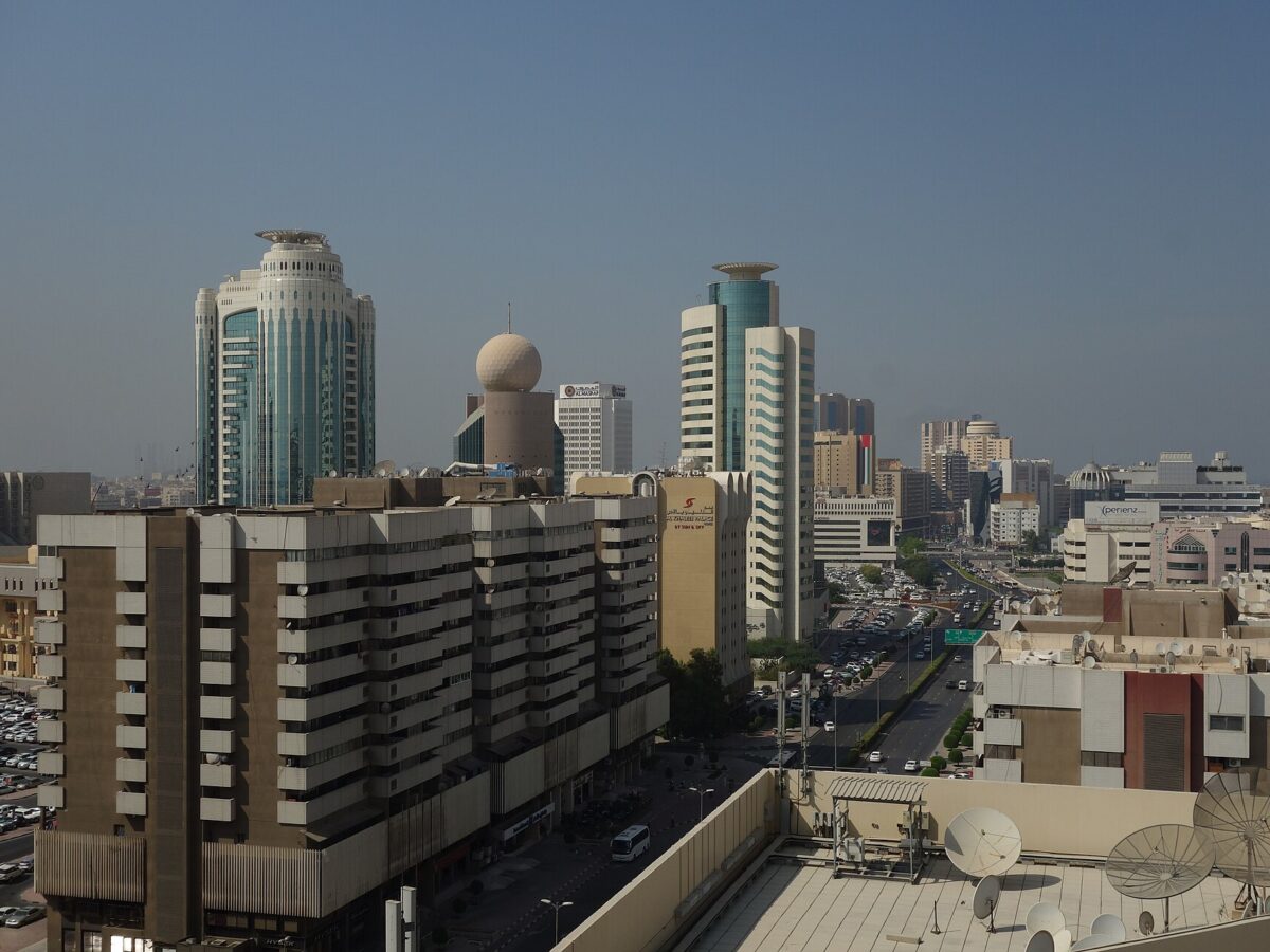 Deira skyline with towers and a busy road, Dubai