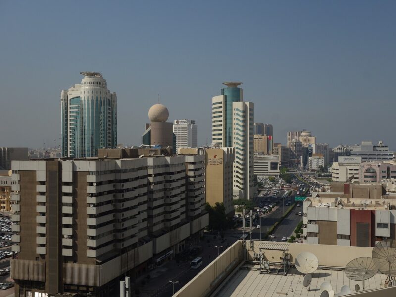 Deira skyline with towers and a busy road, Dubai